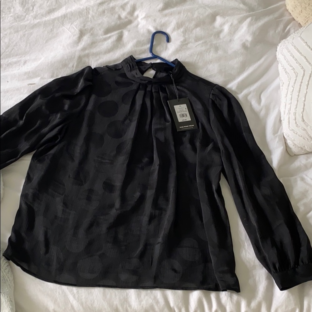 Black sheet blouse with circles